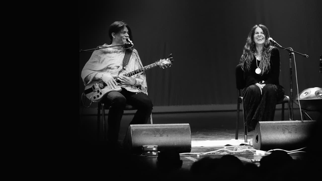 Teodora Brody on stage with a Guitarist